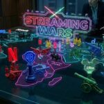 A sprawling, futuristic holographic Risk tabletop map glowing in neon cyan and magenta. The "territories" are different demographic markers. The pawns are sleek, cyber-noir chess pieces, but their "heads" are glowing, glitching holographic projections of the major streaming syndicate logos (an aggressive red "N", a blue "Max" shield, a Mickey silhouette made of static, etc.). A purple digital crosshair hovers over a heavily contested "territory."