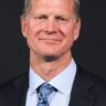 A headshot of Bill Dubuque.