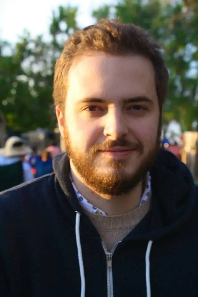 A headshot of Harrison Query.