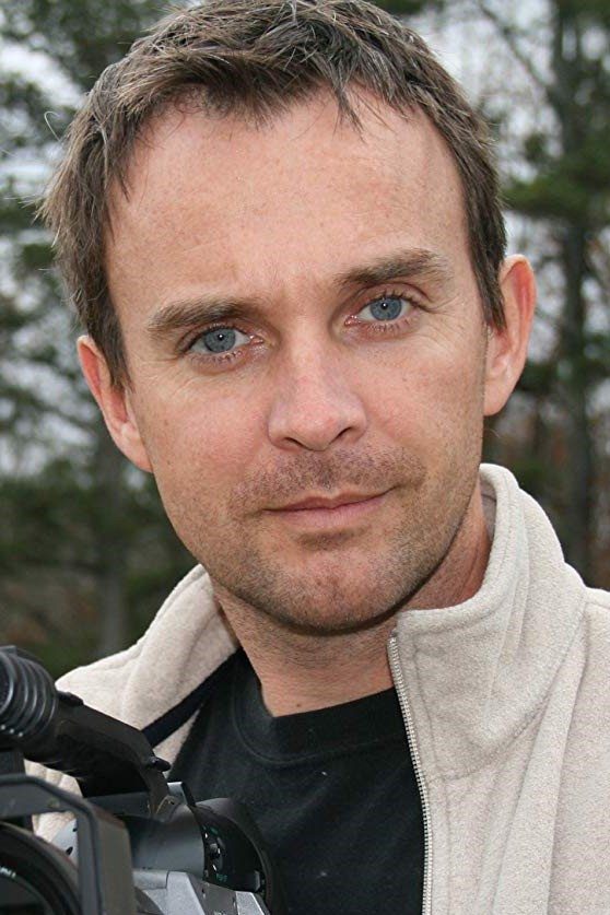 A headshot of Tim Andrew.