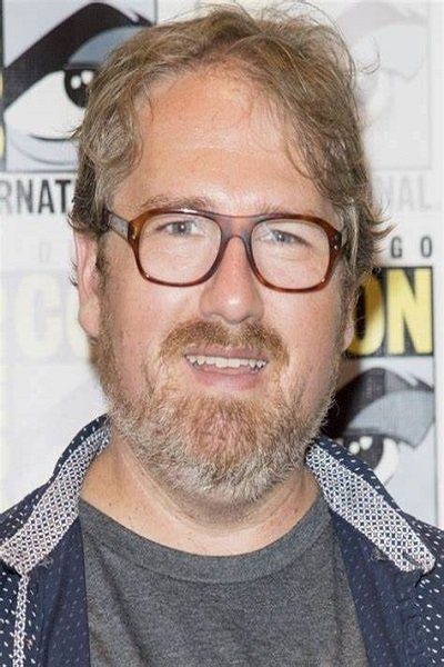A headshot of Andrew Dabb.