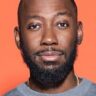 Official headshot photo of person: Lamorne Morris.