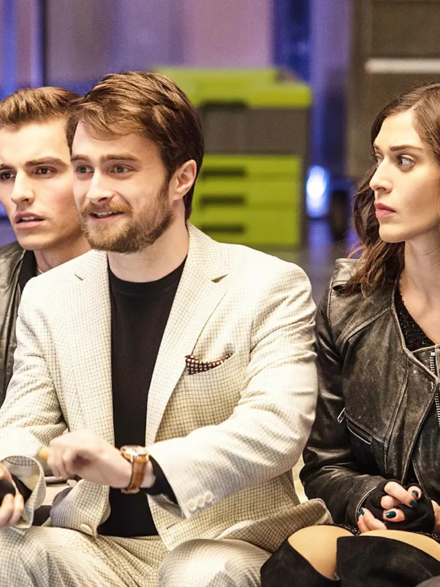 The Four Horsemen (Woody Harrelson, Dave Franco, Lizzy Caplan, Jesse Eisenberg) sitting with Daniel Radcliffe as Walter Mabry in Now You See Me 2.