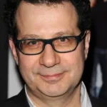 A headshot of Adam Brooks.