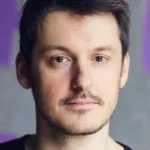 A headshot of Ilya Naishuller.