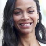 A headshot of Zoe Saldaña.
